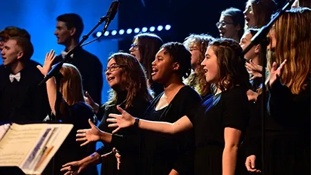 Group of singers in Concert Chorale performing